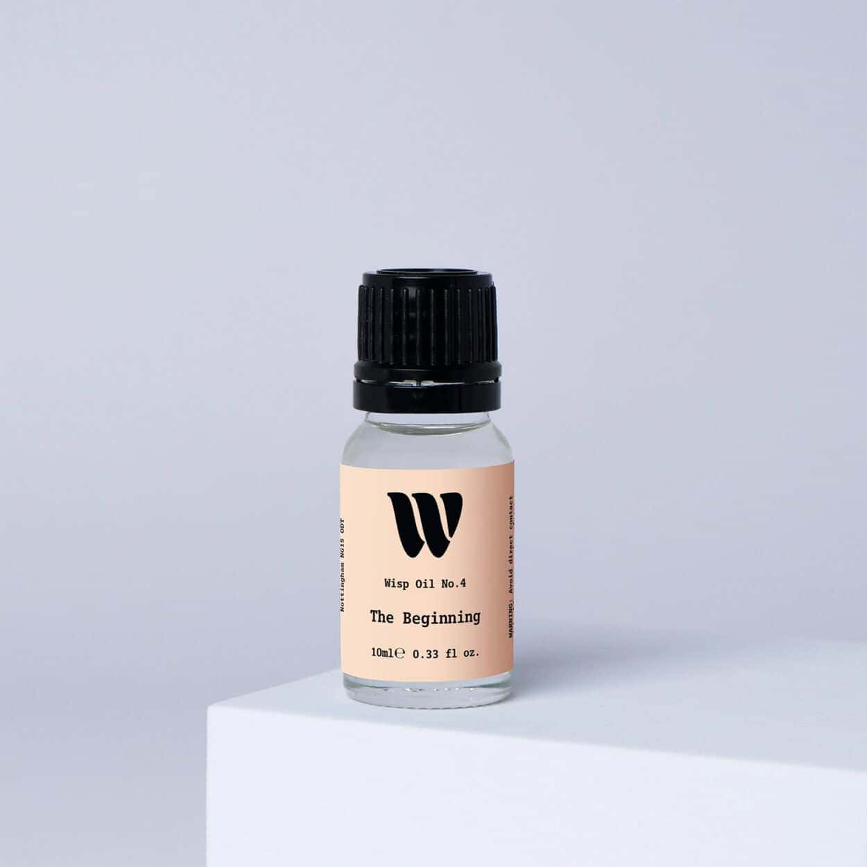 Bottle of the 10ml Wisp home fragrance oil No.4 The Beginning which has notes of sage, lemon and sea salt.