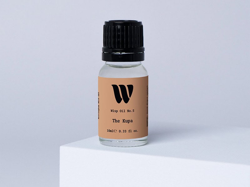 Bottle of the 10ml Wisp home fragrance oil No.5 The Kupa which has notes of leafy and zesty,