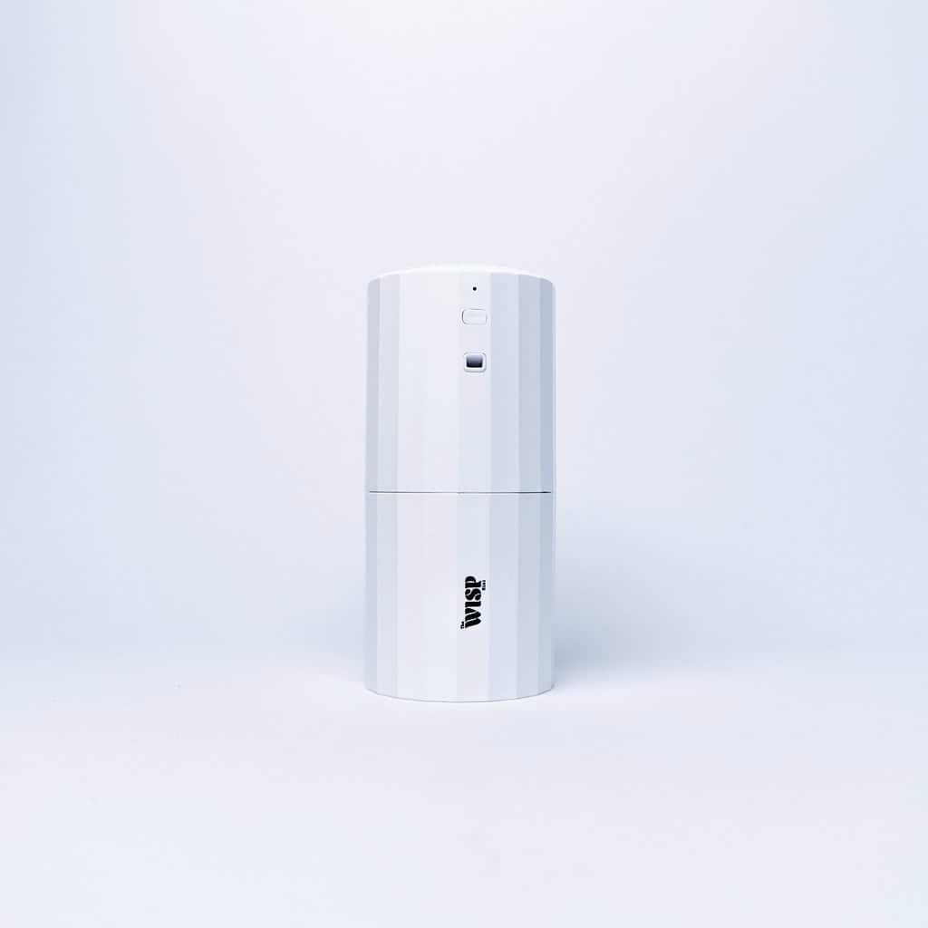 The Wisp Mini plug-in fragrance oil diffuser in white, front view