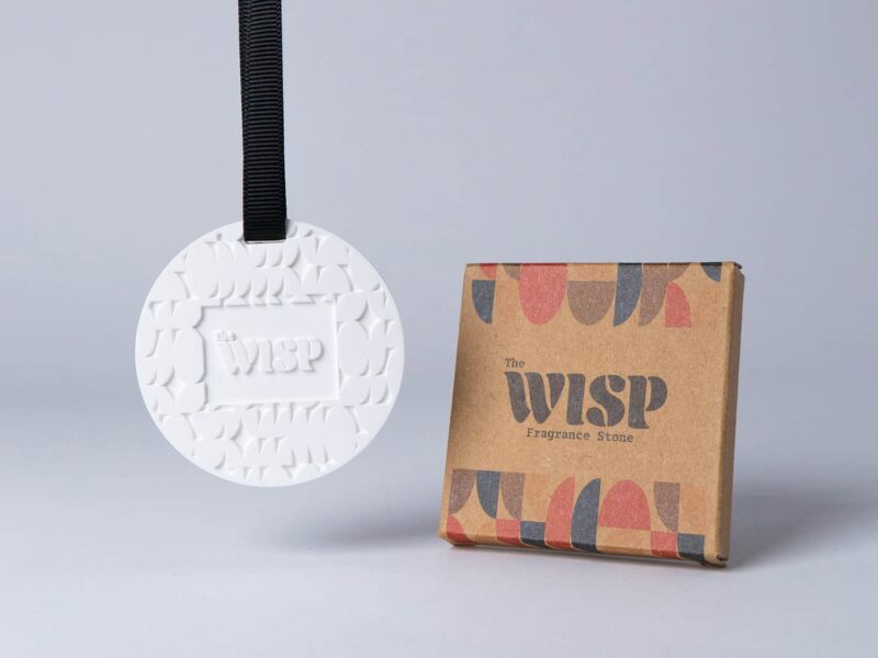 Premium wisp branded essential oil fragrance stone to hang in car or wardrobe.