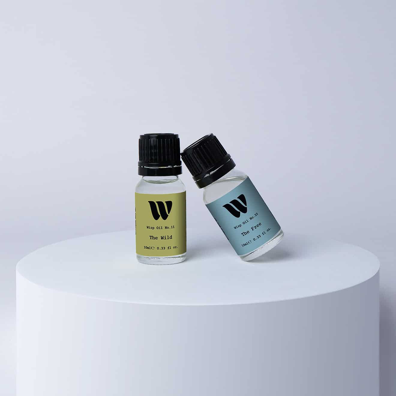 Duo bottles of the 10ml Wisp home fragrance oil No.11 The Wild which has notes of floral lily of the valley and persimmon, and No.25 The Free which has notes of fresh bergamot, lemon and Jasmine. A perfect gift set for birthday and christmas.