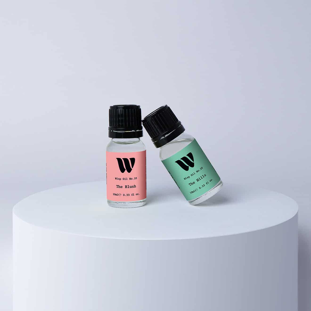 Duo bottles of the 10ml Wisp home fragrance oil No.10 The Blush which has notes of red apple, peony and jasmine, and No.28 The Hills which has notes of citrus, tea and cedarwood. A perfect gift set for birthday and christmas.