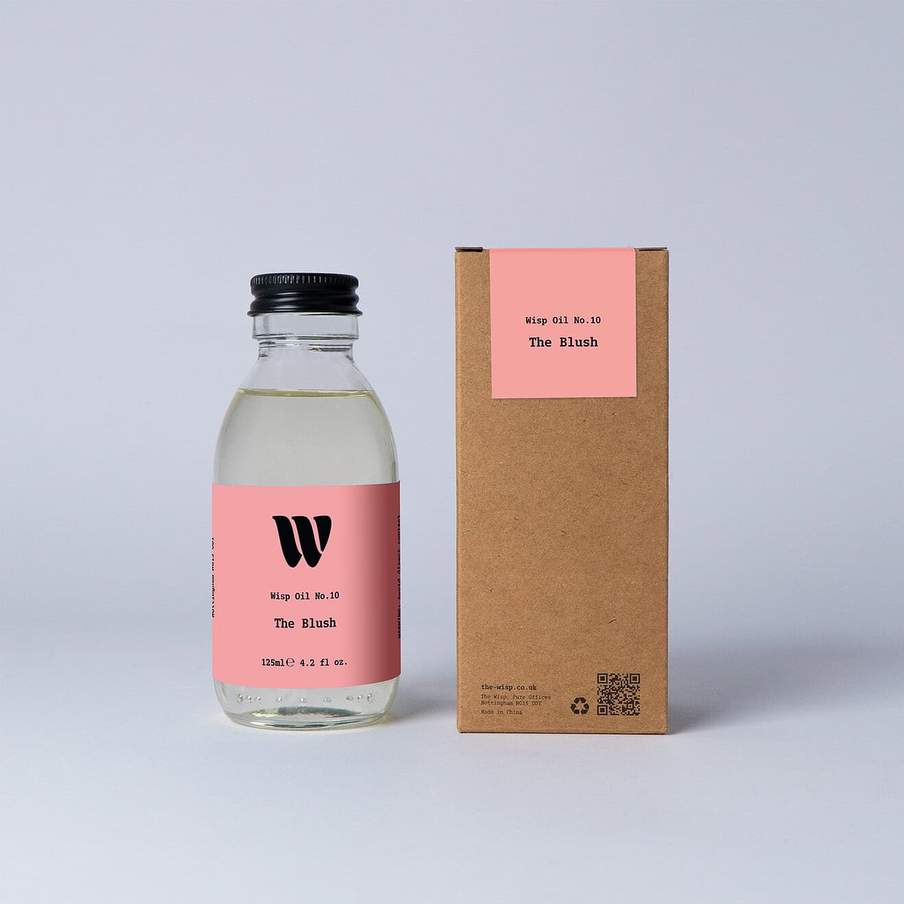 Bottle of the 125ml Wisp home fragrance oil No.10 The Blush which has notes of red apple, peony and jasmine.