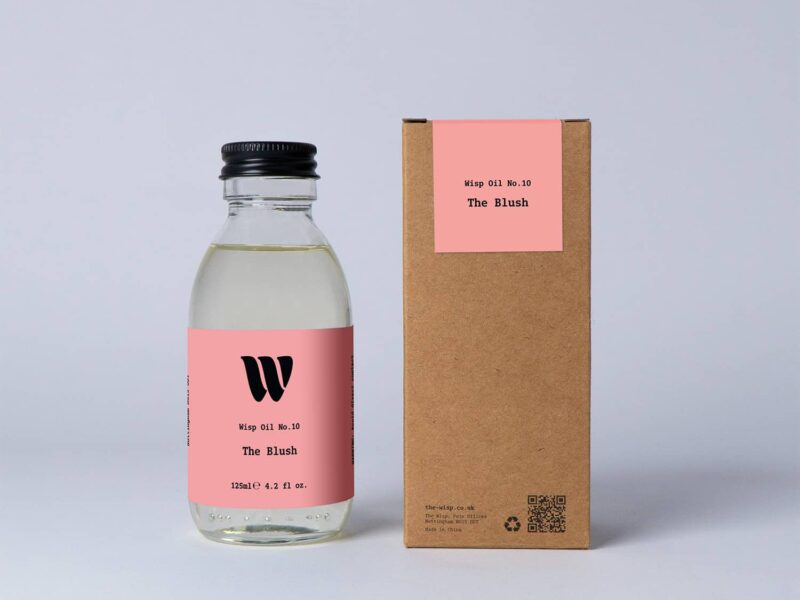 Bottle of the 125ml Wisp home fragrance oil No.10 The Blush which has notes of red apple, peony and jasmine.