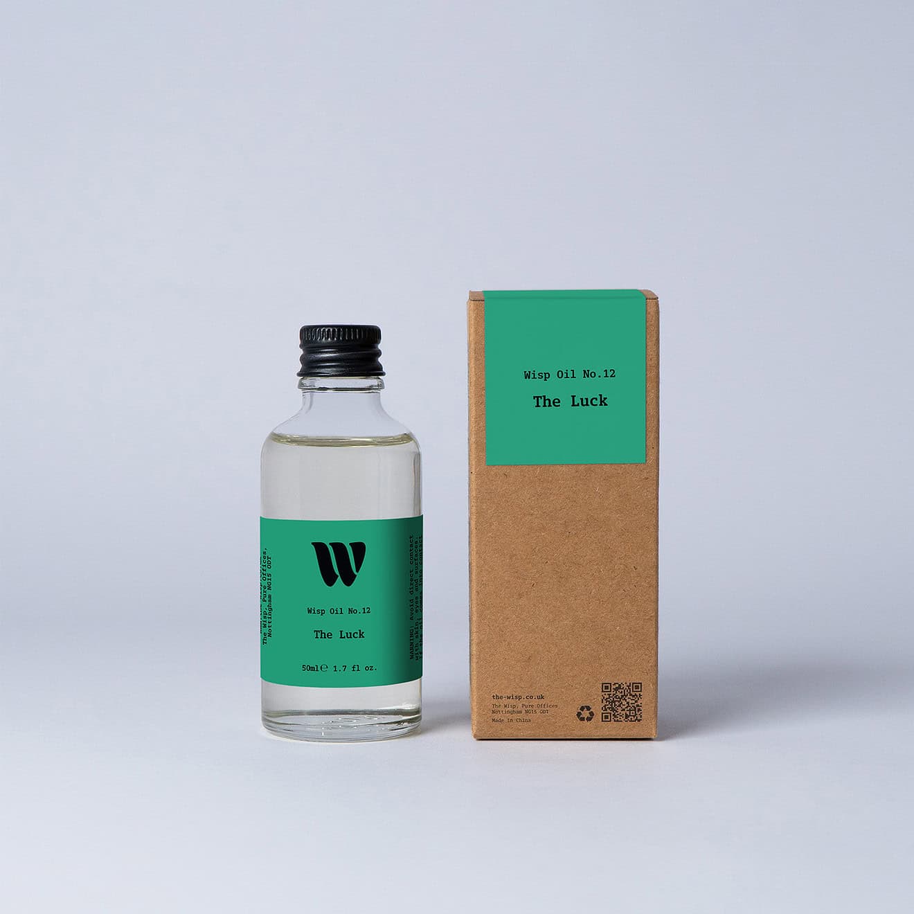 Bottle of the 50ml Wisp home fragrance oil No.12 The Luck which has notes of amber, clover and ivy.