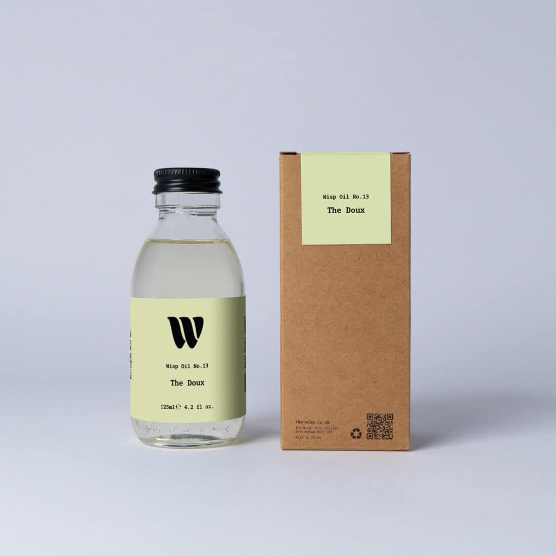 Bottle of the 125ml Wisp home fragrance oil No.13 The Doux which has notes of lush rose, carnation, and ylang-ylang.