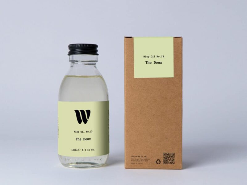 Bottle of the 125ml Wisp home fragrance oil No.13 The Doux which has notes of lush rose, carnation, and ylang-ylang.