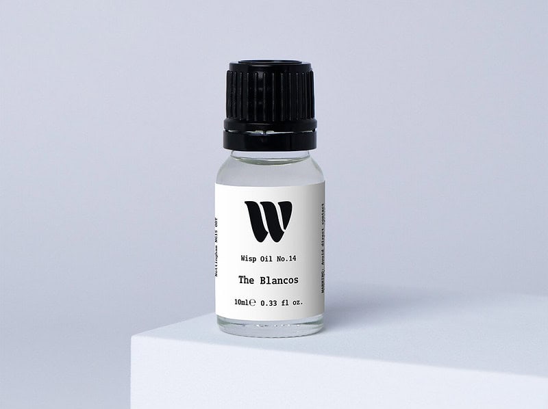 Bottle of the 10ml Wisp home fragrance oil No.14 The Blancos which has notes of soft violet and magnolia.