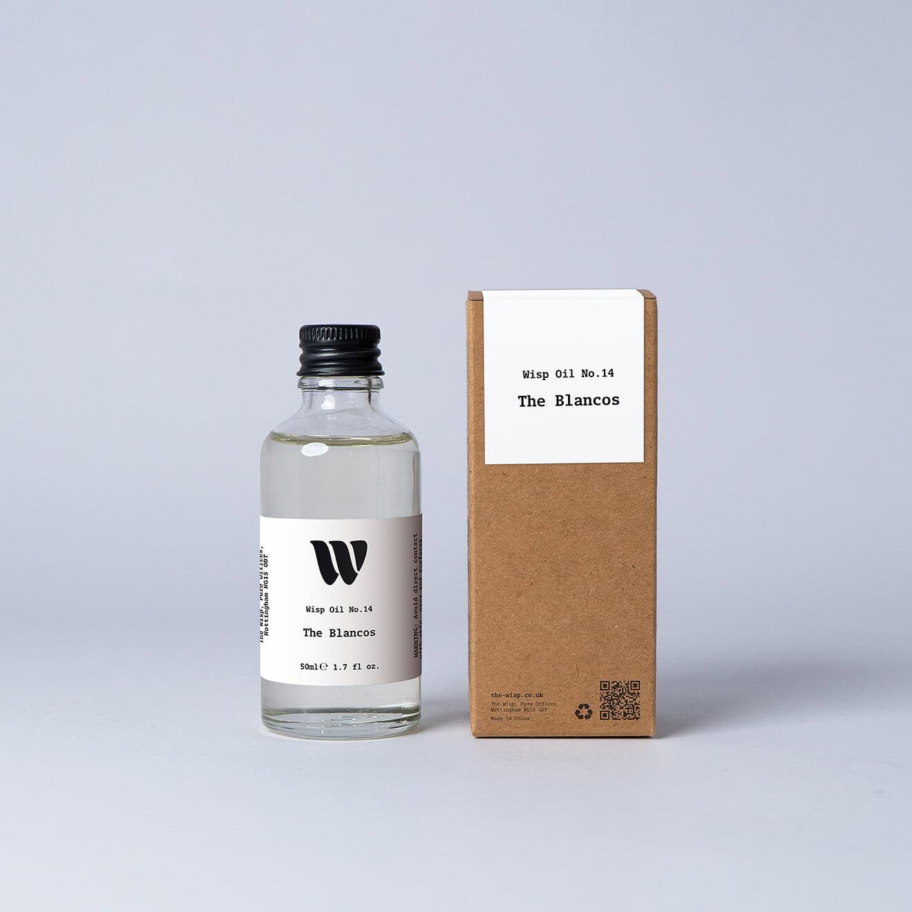 Bottle of the 50ml Wisp home fragrance oil No.14 The Blancos which has notes of soft violet and magnolia.