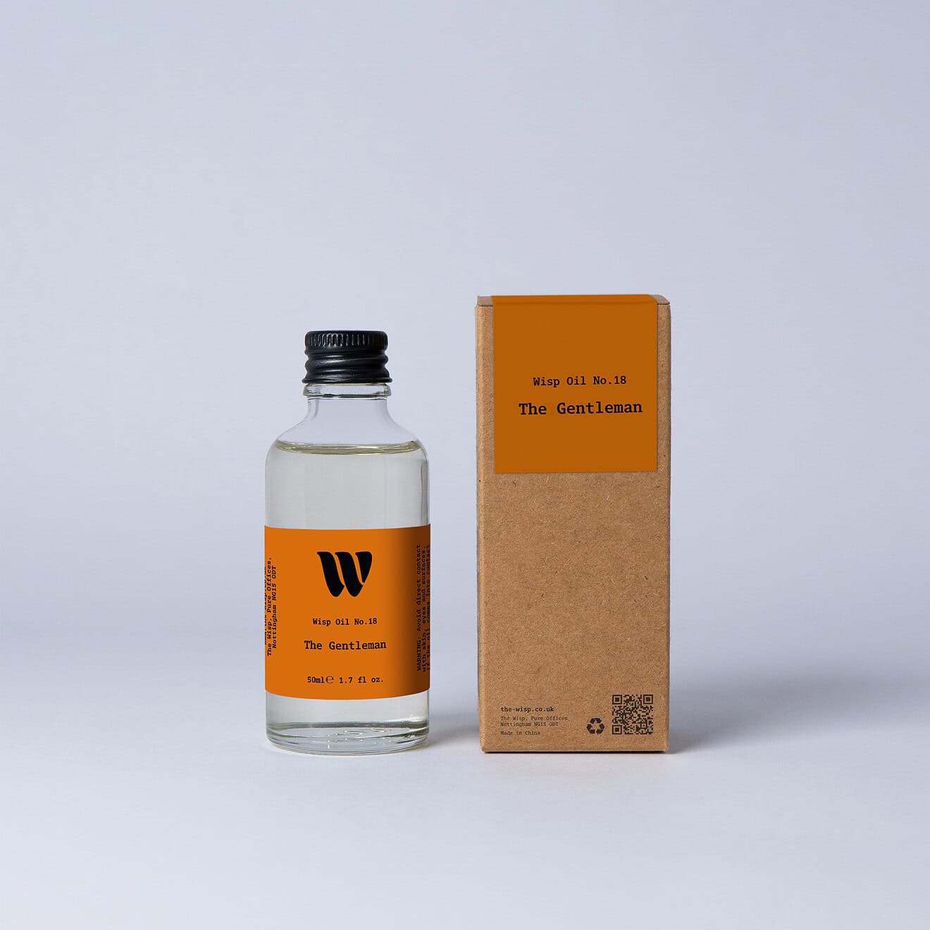 Bottle of the 50ml Wisp home fragrance oil No.18 The Gentleman which has notes of saffron, raspberry, and thyme.