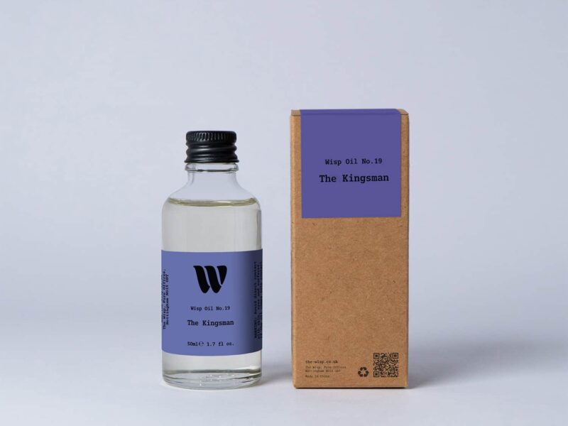 Bottle of the 50ml Wisp home fragrance oil No.19 The Kingsman which has notes of smoky sandalwood and vetiver.