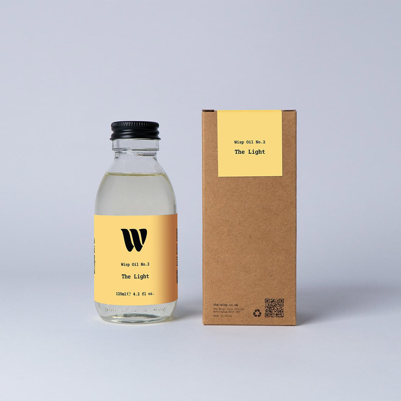 Bottle of the 125ml Wisp home fragrance oil No.2 The Light which has notes of citrus, fresh grass and ocean breeze