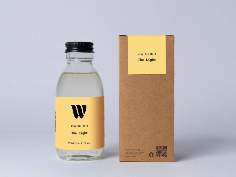 Bottle of the 125ml Wisp home fragrance oil No.2 The Light which has notes of citrus, fresh grass and ocean breeze