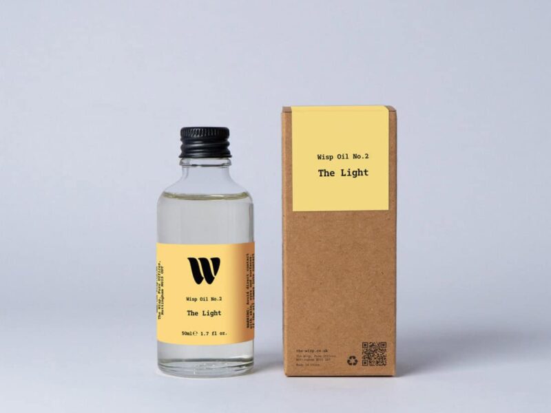 Bottle of the 50ml Wisp home fragrance oil No.2 The Light which has notes of citrus, fresh grass and ocean breeze