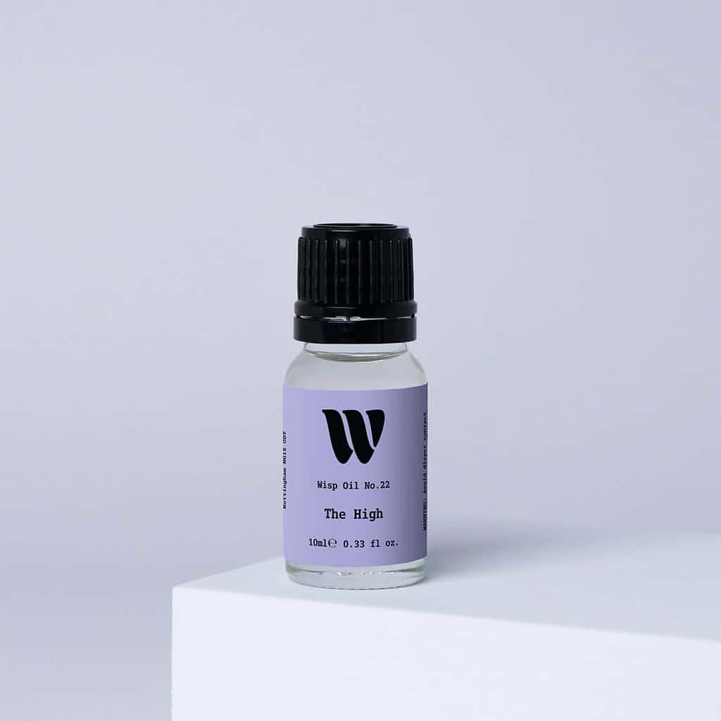 Bottle of the 10ml Wisp home fragrance oil No.22 The High which has notes of citrus, patchouli and sandalwood.