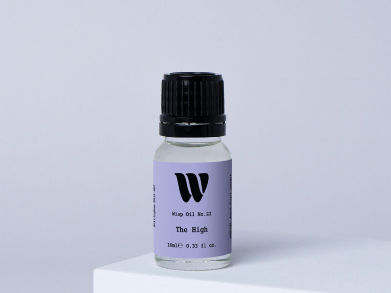 Bottle of the 10ml Wisp home fragrance oil No.22 The High which has notes of citrus, patchouli and sandalwood.