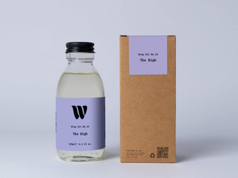 Bottle of the 125ml Wisp home fragrance oil No.22 The High which has notes of citrus, patchouli and sandalwood.