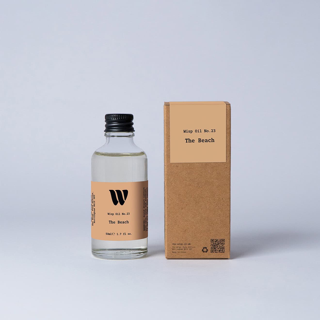 Bottle of the 50ml Wisp home fragrance oil No.23 The Beach which has notes of subtle spices.