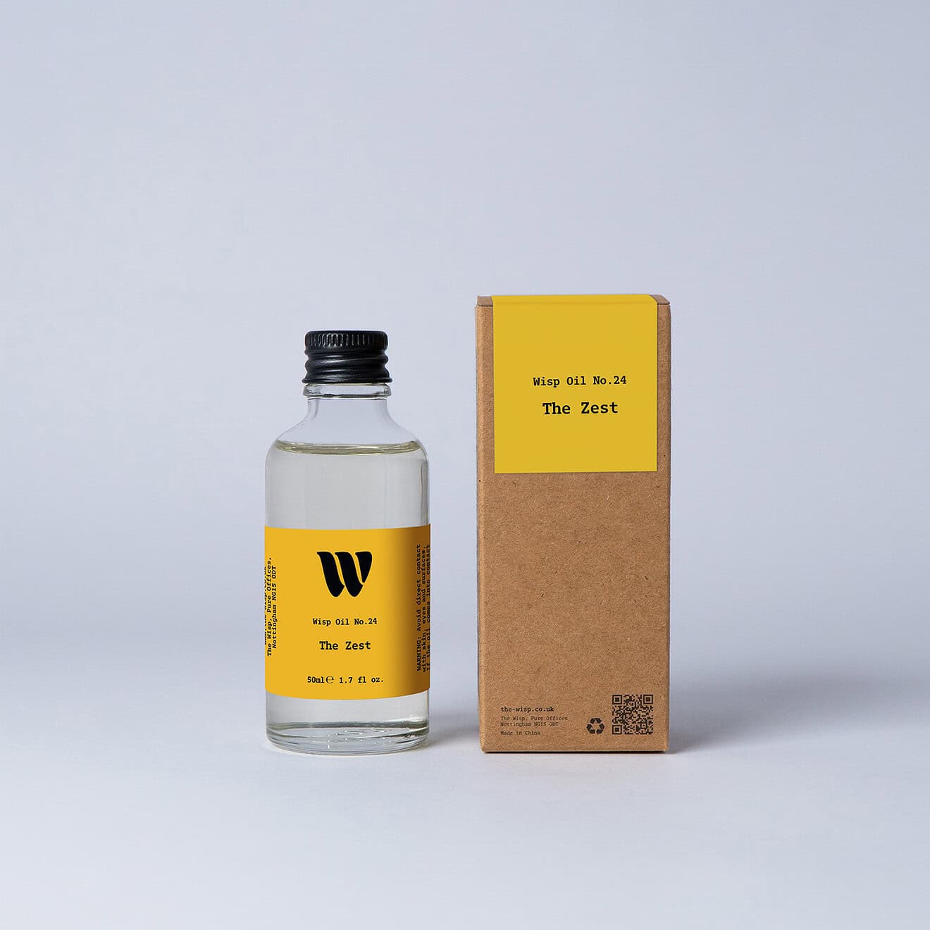 Bottle of the 50ml Wisp home fragrance oil No.24 The Zest which has notes of citrus, spiced ginger and cardamom