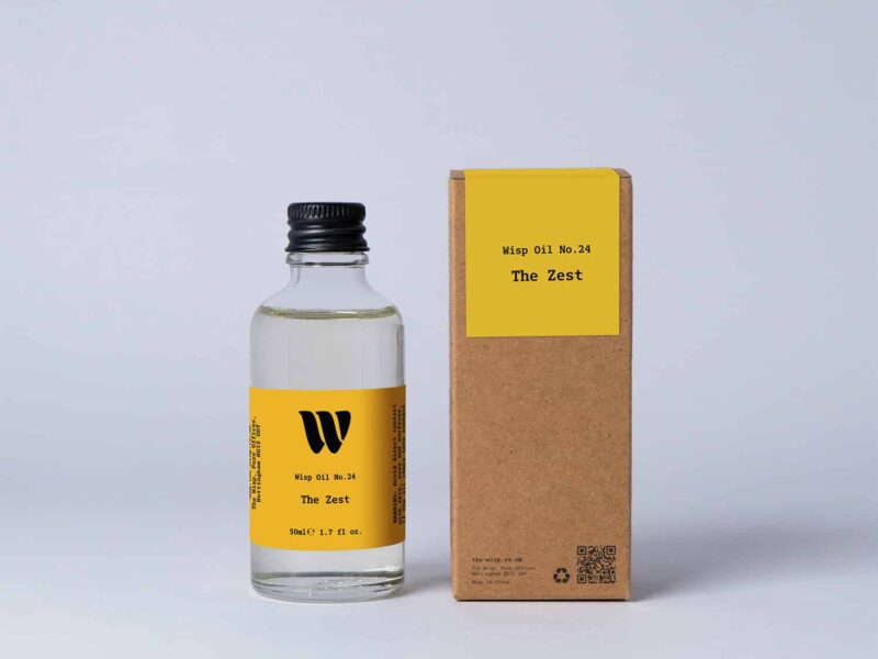 Bottle of the 50ml Wisp home fragrance oil No.24 The Zest which has notes of citrus, spiced ginger and cardamom