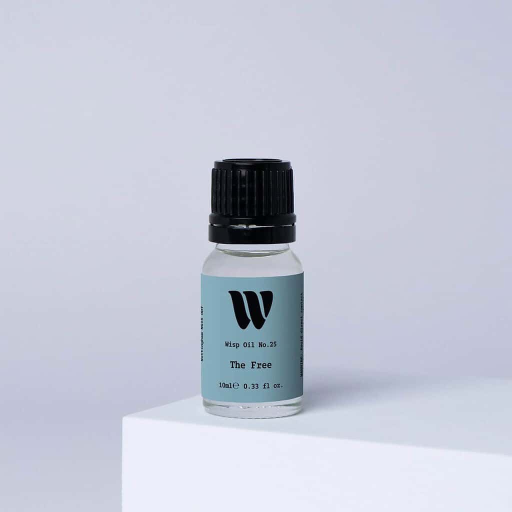 Bottle of the 10ml Wisp home fragrance oil No.25 The Free which has notes of fresh bergamot, lemon and Jasmine.
