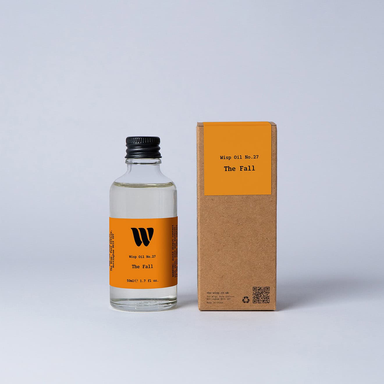 Bottle of the 50ml Wisp home fragrance oil No.27 The Fall which has notes of cedarwood, cardamom and pink pepper.