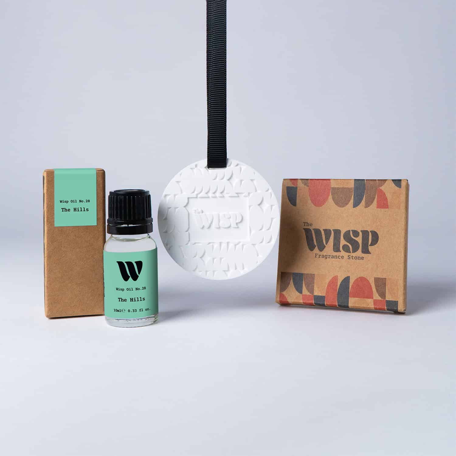 The Hills Fragrance Stone gift set by The Wisp — ceramic scent stone, 10ml green herbal home fragrance oil and kraft box