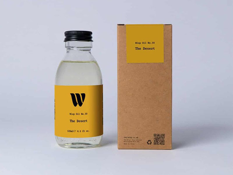 Bottle of the 125ml Wisp home fragrance oil No.30 The Desert which has notes of mandarin and Californian lemon.