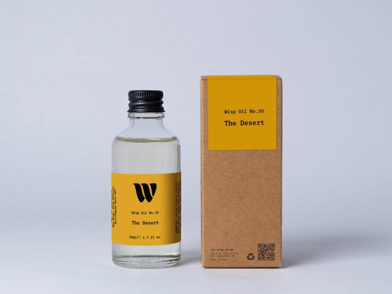 Bottle of the 50ml Wisp home fragrance oil No.30 The Desert which has notes of mandarin and Californian lemon.