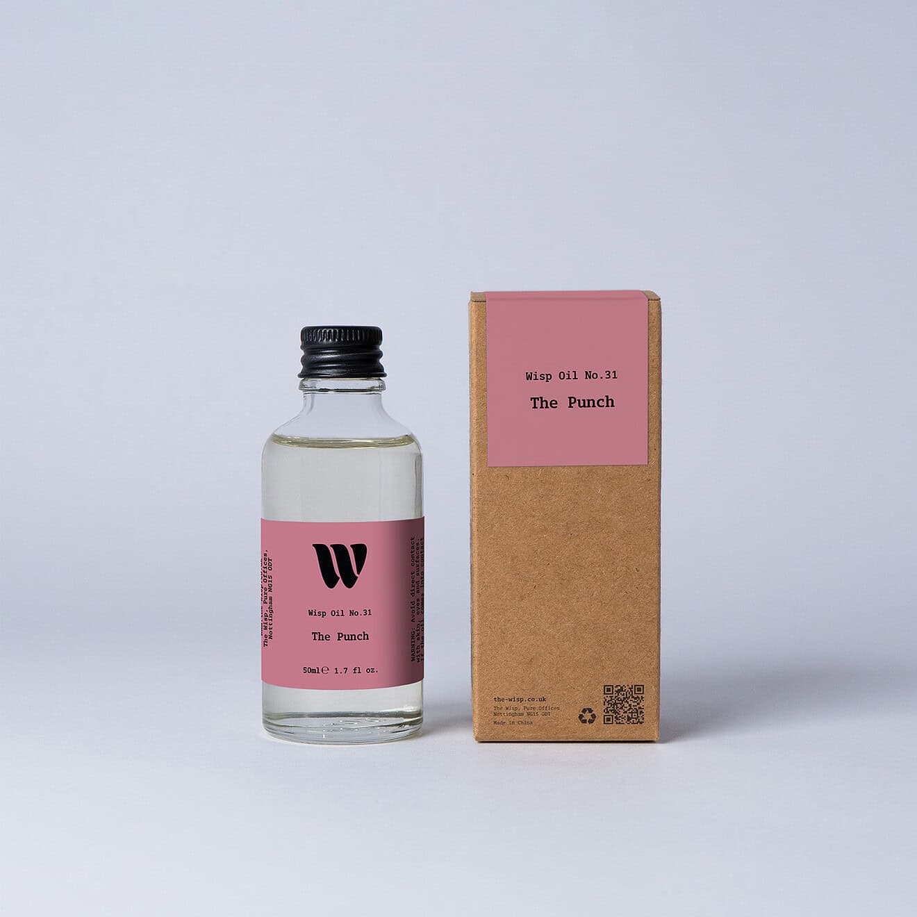 Bottle of the 50ml Wisp home fragrance oil No.31 The Punch which has notes of Mandarin and Orange Blossom