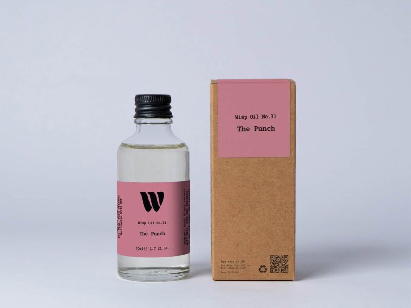 Bottle of the 50ml Wisp home fragrance oil No.31 The Punch which has notes of Mandarin and Orange Blossom