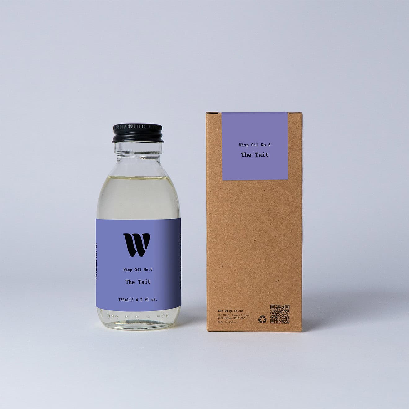 Bottle of the 125ml Wisp home fragrance oil No.6 The Tait which has notes of orange and grass.