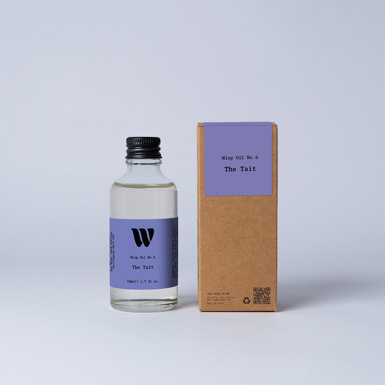 Bottle of the 50ml Wisp home fragrance oil No.6 The Tait which has notes of orange and grass.