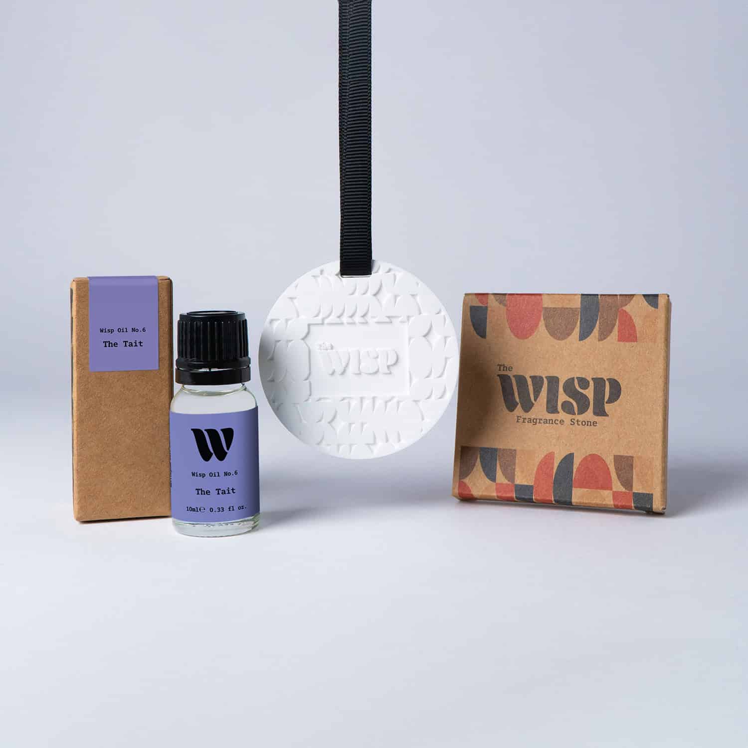 The Tait Fragrance Stone gift set by The Wisp — ceramic scent stone, 10ml bright citrus home fragrance oil and kraft box