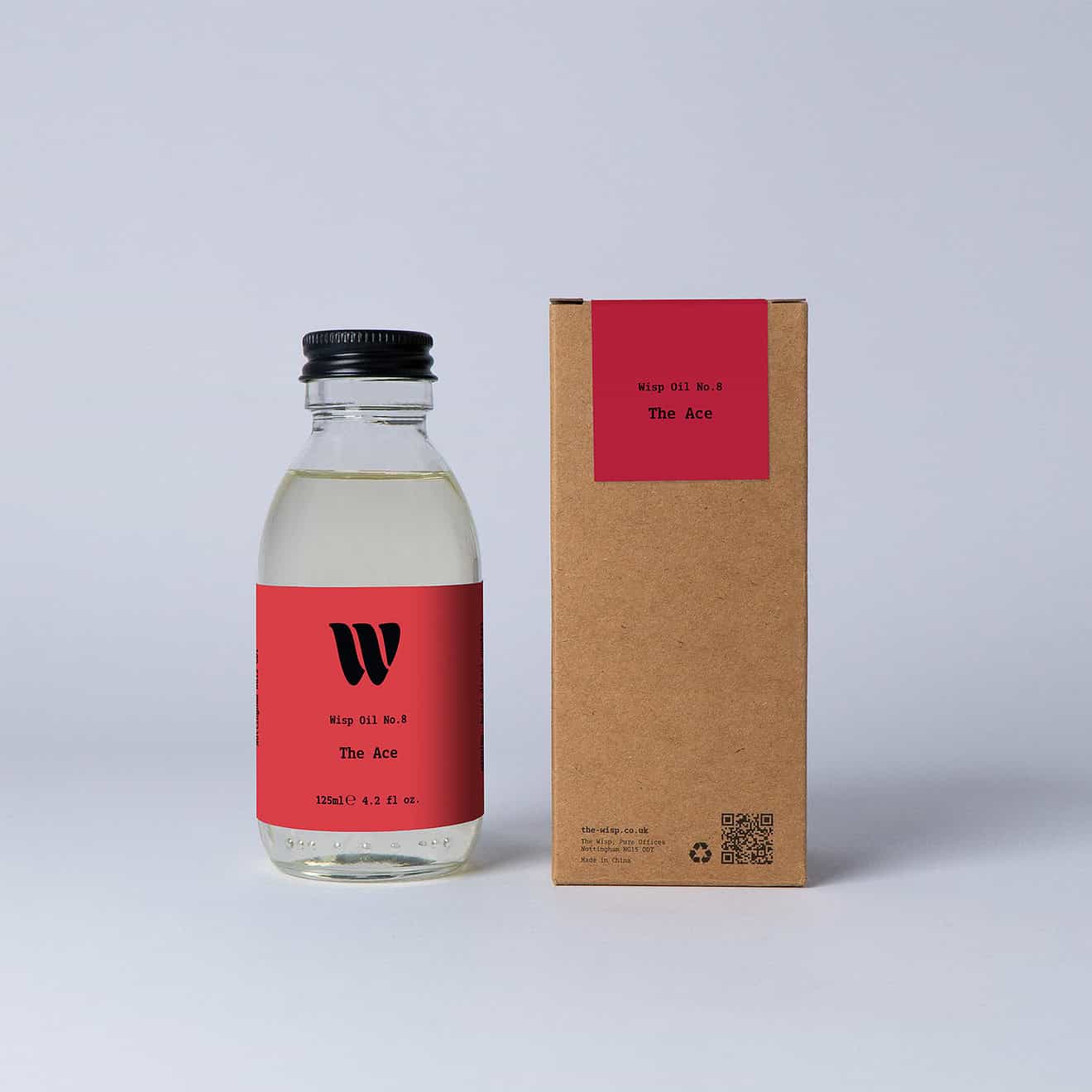 Bottle of the 125ml Wisp home fragrance oil No.8 The Ace which has notes of citrus, aromatic herbs, and florals