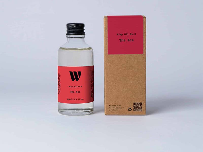 Bottle of the 50ml Wisp home fragrance oil No.8 The Ace which has notes of citrus, aromatic herbs, and florals