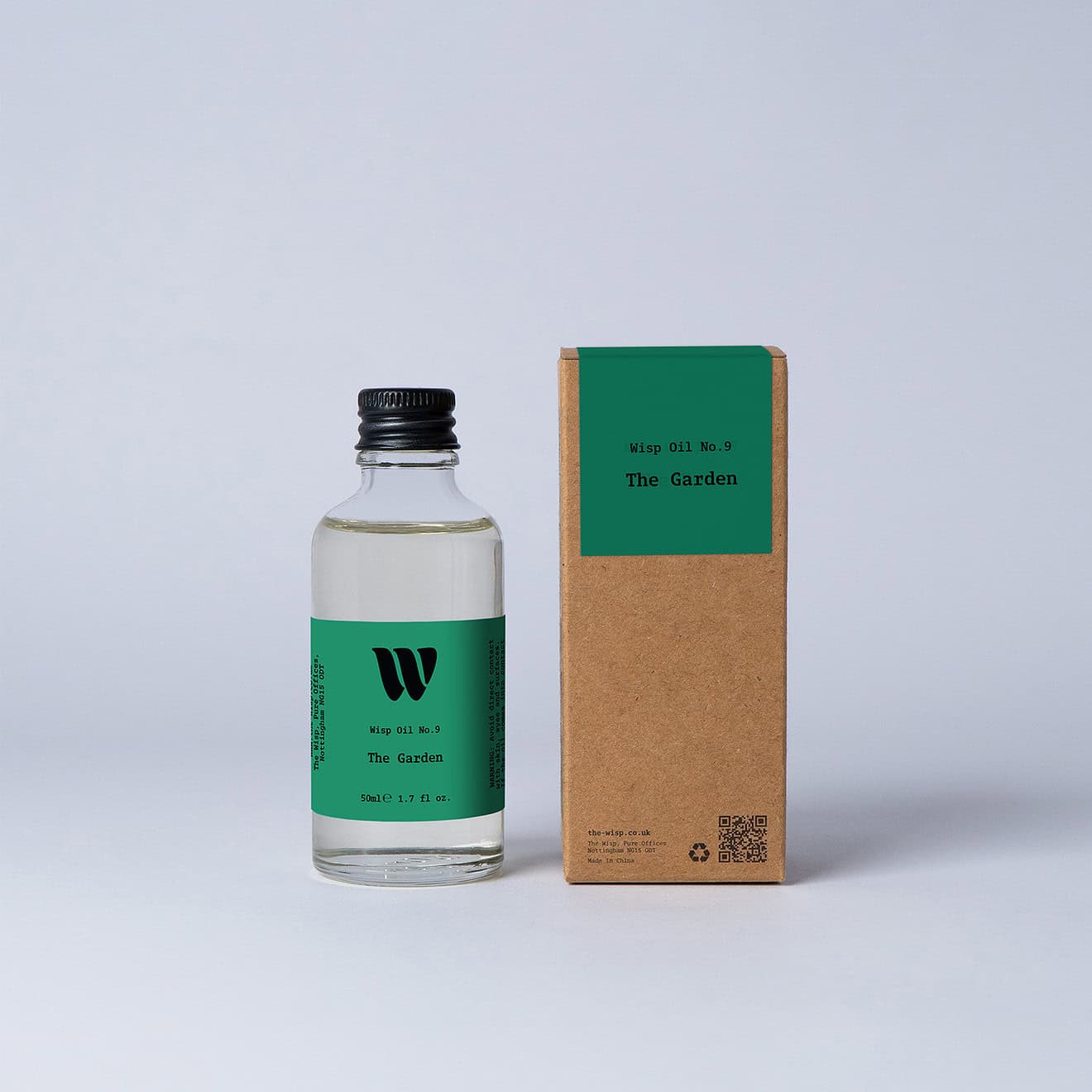 Bottle of the 50ml Wisp home fragrance oil No.9 The Garden which has notes of lotus blossom and water lily.